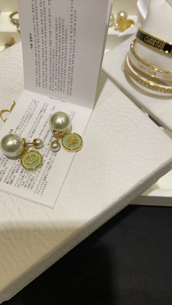 Dior Tribales green resin round earrings